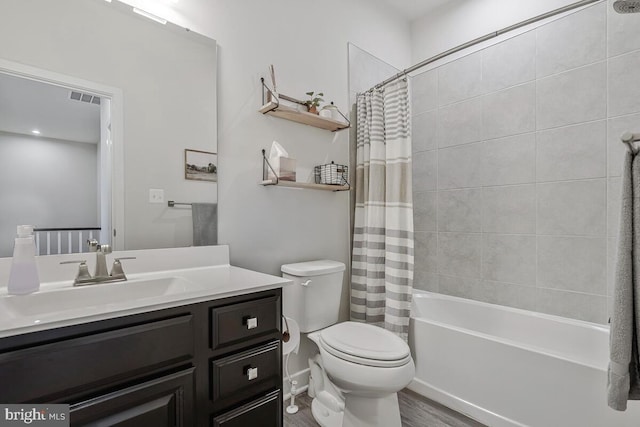 14540 Grace Kellen Ave, Brandywine, MD 20613 - bathroom featuring wood finished floors, toilet, shower / tub combo, and vanity