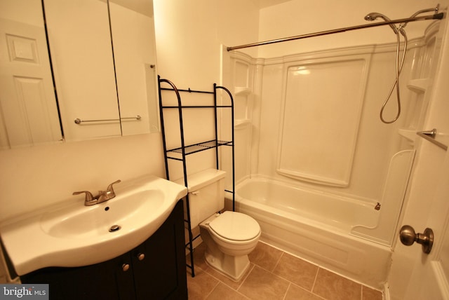 full bath featuring shower / bath combination, tile patterned flooring, toilet, and vanity