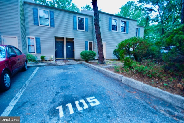 view of front of home with uncovered parking
