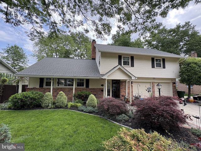 8513 Bound Brook Ln, Alexandria, VA 22309 - traditional-style house featuring brick siding, a chimney, a front lawn, and a garage