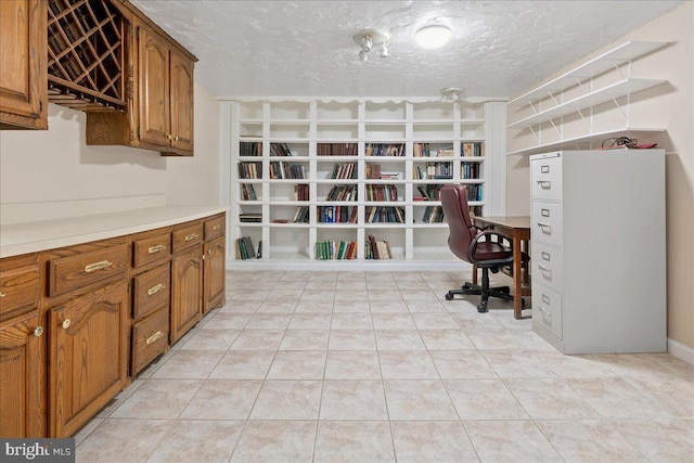 8513 Bound Brook Ln, Alexandria, VA 22309 - office area with a textured ceiling and light tile patterned floors