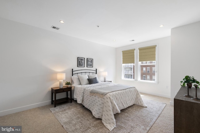 1418 N Rhodes St Unit B401, Arlington, VA 22209 - bedroom with light colored carpet, baseboards, and recessed lighting