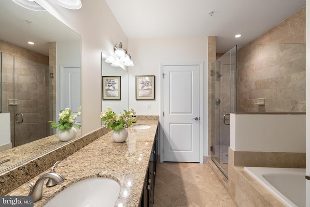 1418 N Rhodes St Unit B401, Arlington, VA 22209 - full bath with double vanity, a stall shower, a garden tub, recessed lighting, and tile patterned floors