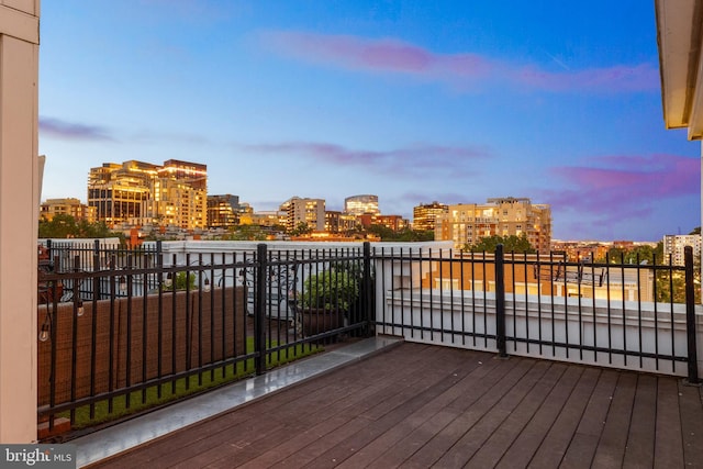 1418 N Rhodes St Unit B401, Arlington, VA 22209 - deck at dusk featuring a city view