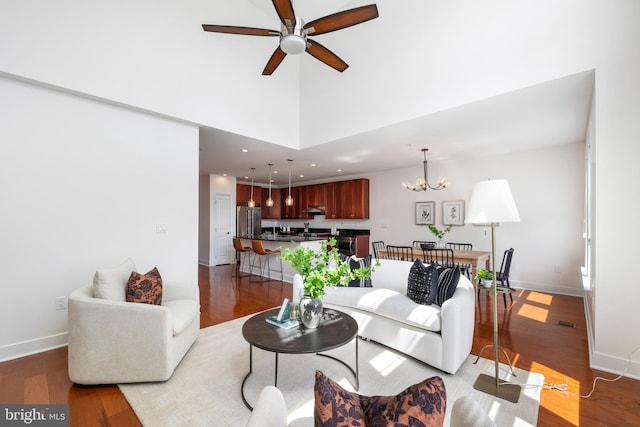 1418 N Rhodes St Unit B401, Arlington, VA 22209 - living area featuring a ceiling fan, dark wood-style flooring, baseboards, a chandelier, and recessed lighting