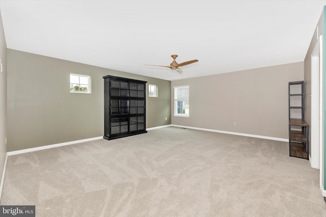 5609 Zoe Ln, Frederick, MD 21704 - spare room featuring a ceiling fan, baseboards, and carpet flooring