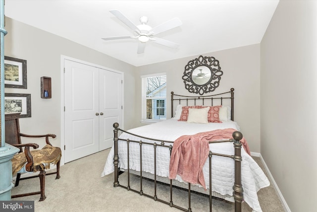 5609 Zoe Ln, Frederick, MD 21704 - bedroom with light carpet, a closet, a ceiling fan, and baseboards