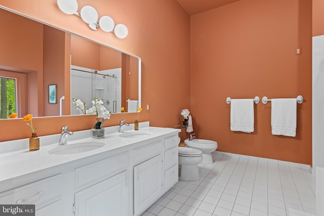 1420 Little Conestoga Rd, Glenmoore, PA 19343 - bathroom featuring a bidet, curtained shower, tile patterned floors, double vanity, and toilet