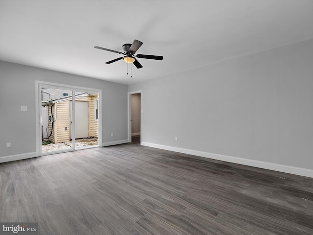 1079 Notley Ct, Pasadena, MD 21122 - unfurnished room featuring baseboards, dark wood finished floors, and ceiling fan