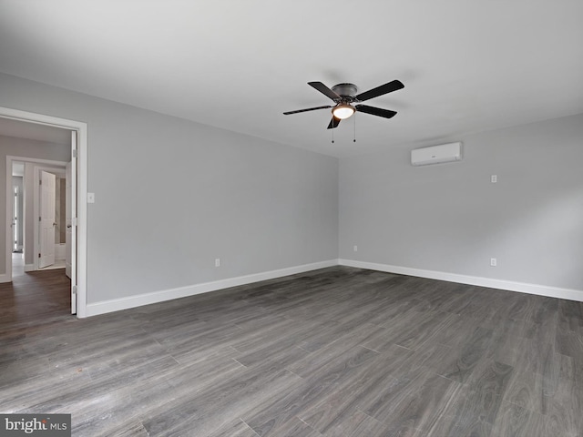 1079 Notley Ct, Pasadena, MD 21122 - empty room with a wall mounted AC, a ceiling fan, dark wood-type flooring, and baseboards
