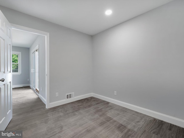 1079 Notley Ct, Pasadena, MD 21122 - empty room featuring wood finished floors, baseboards, and recessed lighting