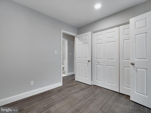 1079 Notley Ct, Pasadena, MD 21122 - unfurnished bedroom with wood finished floors, baseboards, a closet, and recessed lighting