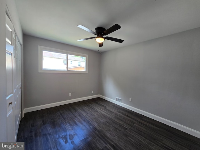 1079 Notley Ct, Pasadena, MD 21122 - empty room with ceiling fan, dark wood-type flooring, and baseboards