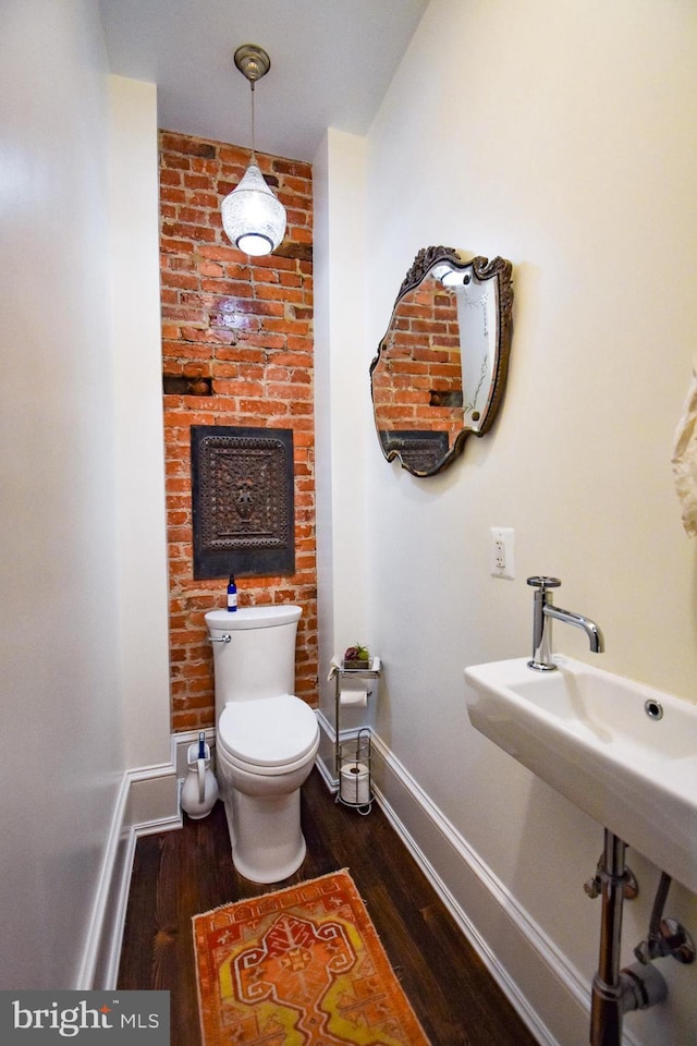 1830 Columbia Rd NW, Washington, DC 20009 - half bath with toilet, wood finished floors, and baseboards