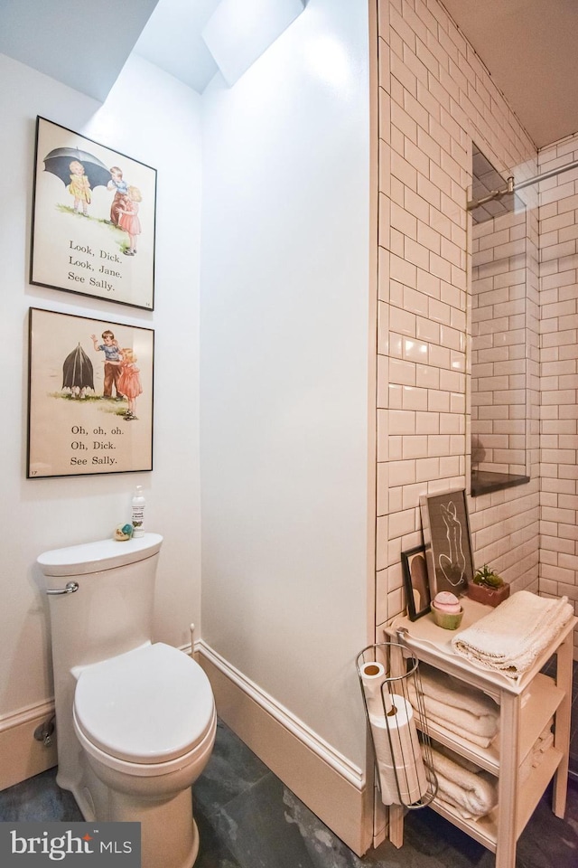 1830 Columbia Rd NW, Washington, DC 20009 - bathroom featuring baseboards and toilet