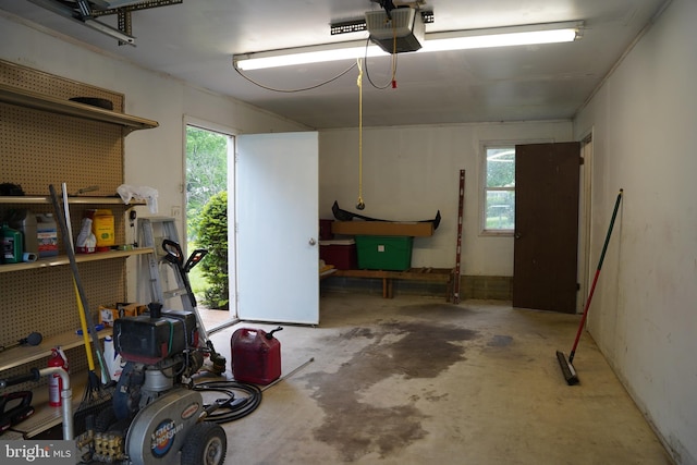 garage featuring a garage door opener
