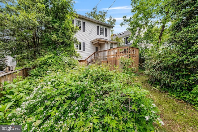 view of yard featuring a wooden deck