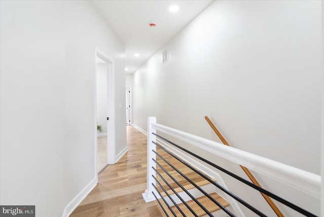 2312 Edmondson Ave, Baltimore, MD 21223 - corridor with an upstairs landing, recessed lighting, light wood-type flooring, and baseboards
