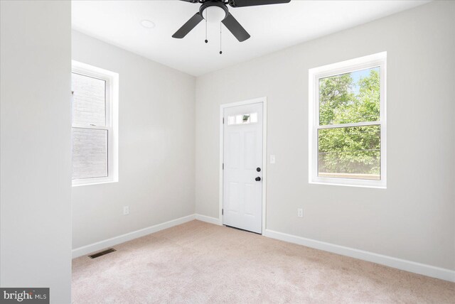 2312 Edmondson Ave, Baltimore, MD 21223 - carpeted spare room featuring baseboards and a ceiling fan