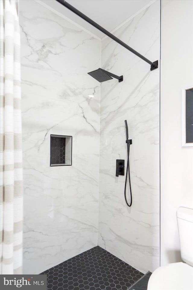 2312 Edmondson Ave, Baltimore, MD 21223 - full bath with a marble finish shower and toilet