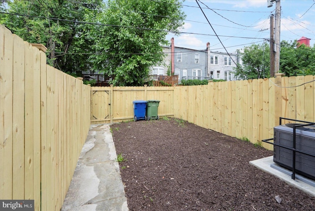 2312 Edmondson Ave, Baltimore, MD 21223 - fenced backyard with central AC unit