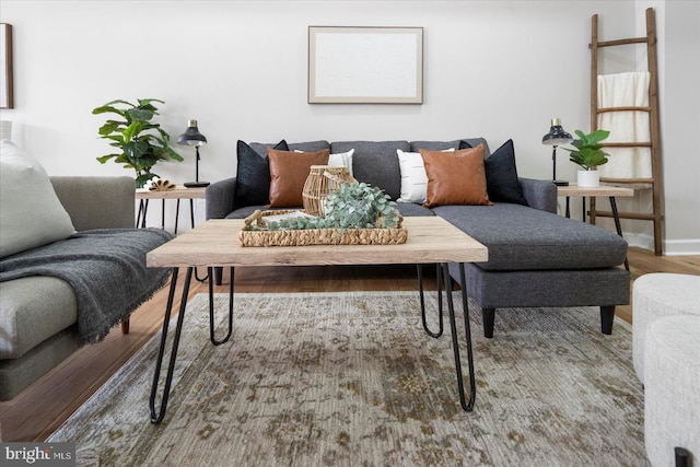 2312 Edmondson Ave, Baltimore, MD 21223 - living area featuring wood finished floors and baseboards