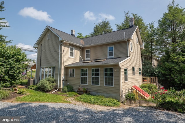 1501 Long Corner Rd, Mount Airy, MD 21771 - view of front of home with a chimney, central AC unit, and roof with shingles