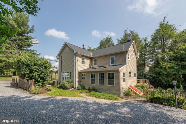 1501 Long Corner Rd, Mount Airy, MD 21771 - back of house with a chimney and central air condition unit