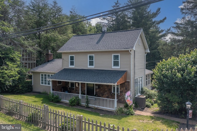 1501 Long Corner Rd, Mount Airy, MD 21771 - view of front facade featuring covered porch, central air condition unit, and a shingled roof