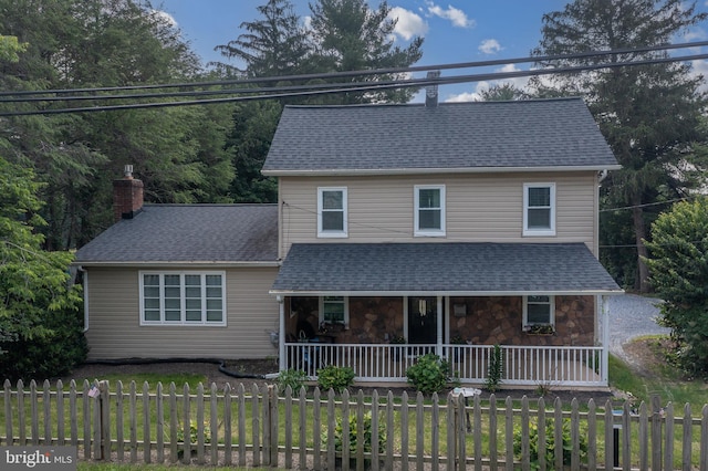 1501 Long Corner Rd, Mount Airy, MD 21771 - view of front of property with a porch, a chimney, a fenced front yard, and a shingled roof