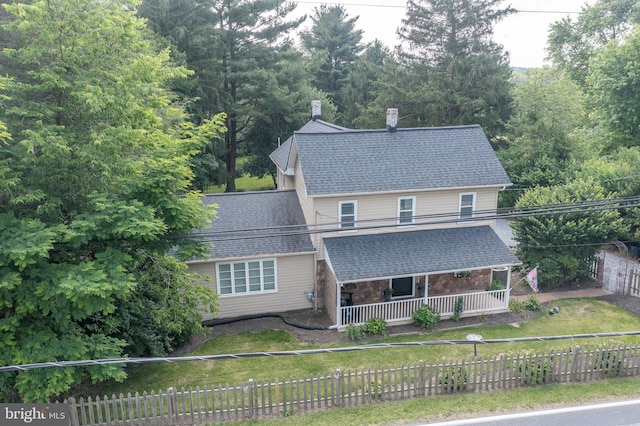 1501 Long Corner Rd, Mount Airy, MD 21771 - rear view of house with a porch, a chimney, roof with shingles, and stone siding