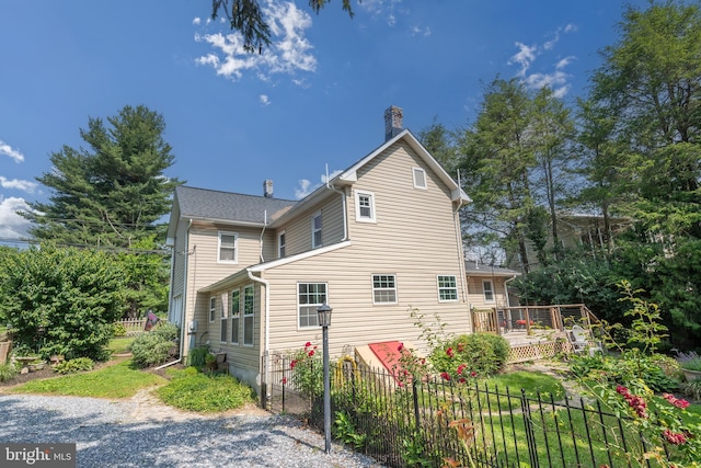 1501 Long Corner Rd, Mount Airy, MD 21771 - rear view of house featuring a chimney and a wooden deck