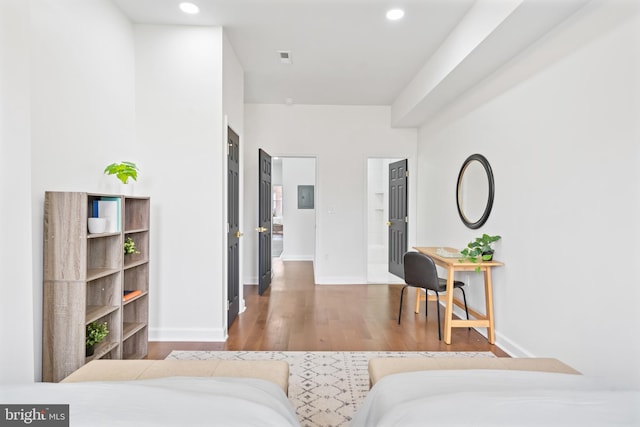bedroom featuring recessed lighting, baseboards, and wood finished floors