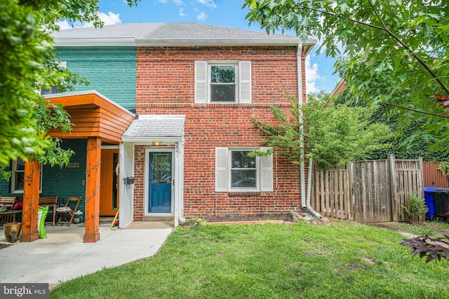 view of front of property featuring brick siding
