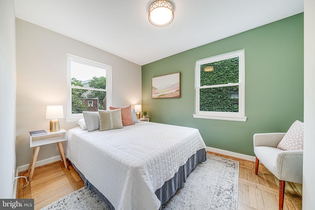 bedroom featuring baseboards