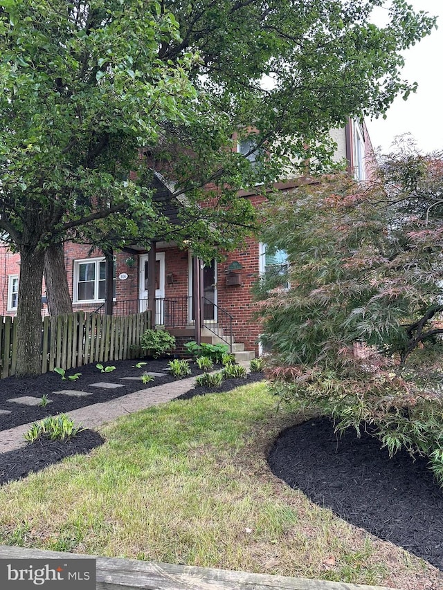 804 S Ode St, Arlington, VA 22204 - obstructed view of property with brick siding and fence
