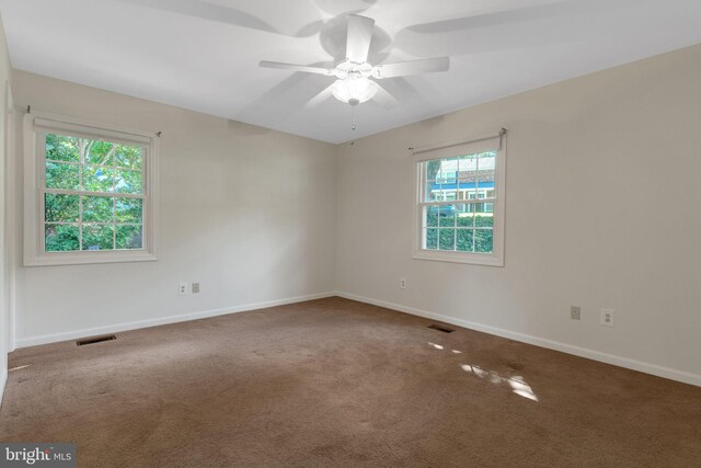 1711 Tedbury St, Crofton, MD 21114 - spare room with carpet, a ceiling fan, and baseboards