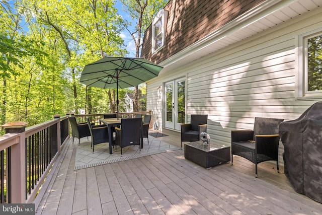 15807 Marlington Dr, Dumfries, VA 22025 - wooden deck with outdoor dining space and french doors