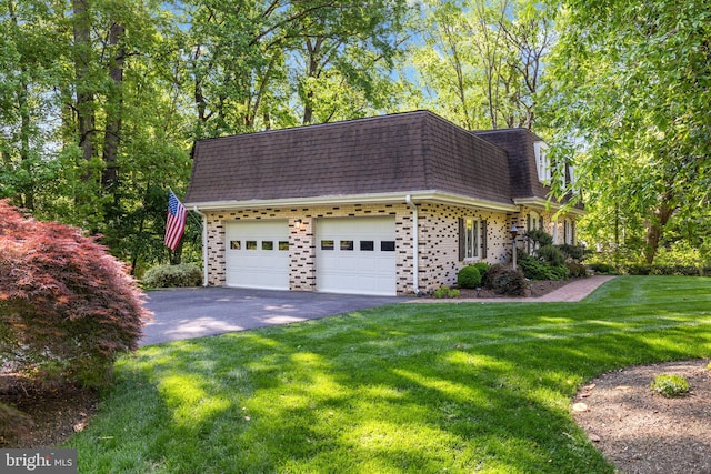 15807 Marlington Dr, Dumfries, VA 22025 - view of front of home featuring an attached garage, aphalt driveway, a front yard, brick siding, and roof with shingles