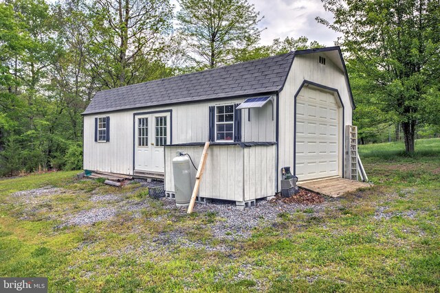 view of outbuilding with an outbuilding