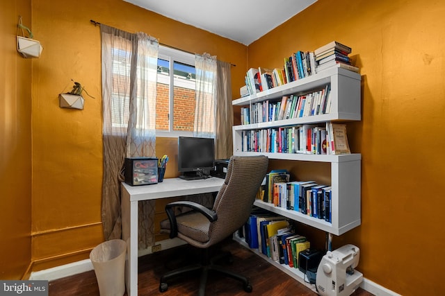 office area with wood finished floors and baseboards