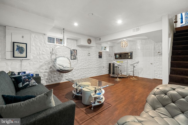 living area with stairway, wood finished floors, and recessed lighting