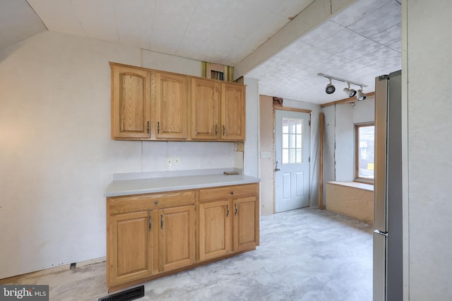 10 E Canal Rd, York, PA 17404 - kitchen featuring freestanding refrigerator, light countertops, and visible vents