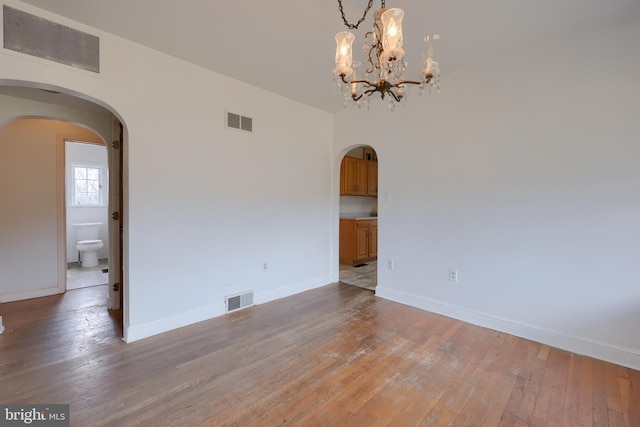 10 E Canal Rd, York, PA 17404 - unfurnished dining area with arched walkways and visible vents