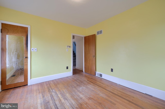 10 E Canal Rd, York, PA 17404 - empty room featuring hardwood / wood-style flooring, baseboards, and visible vents