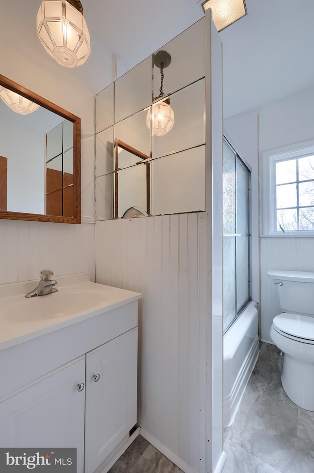 10 E Canal Rd, York, PA 17404 - full bath with vanity, toilet, bathtub / shower combination, and wooden walls
