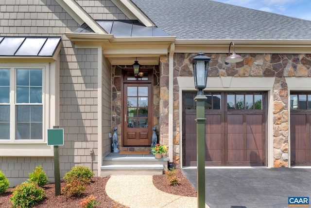 39 Renee Ln, Charlottesville, VA 22901 - property entrance with a shingled roof, a standing seam roof, and stone siding