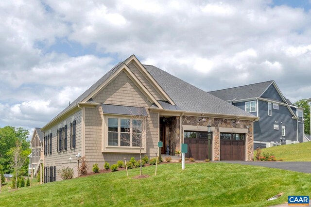 39 Renee Ln, Charlottesville, VA 22901 - craftsman house with driveway, a front lawn, a garage, and stone siding