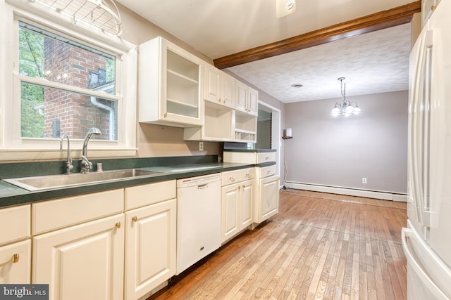 407 Stately Dr, Pasadena, MD 21122 - kitchen with white appliances, a baseboard radiator, a sink, dark countertops, and light wood-style floors