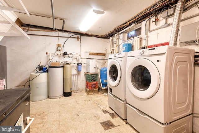 407 Stately Dr, Pasadena, MD 21122 - laundry area featuring tile patterned floors and washer and dryer